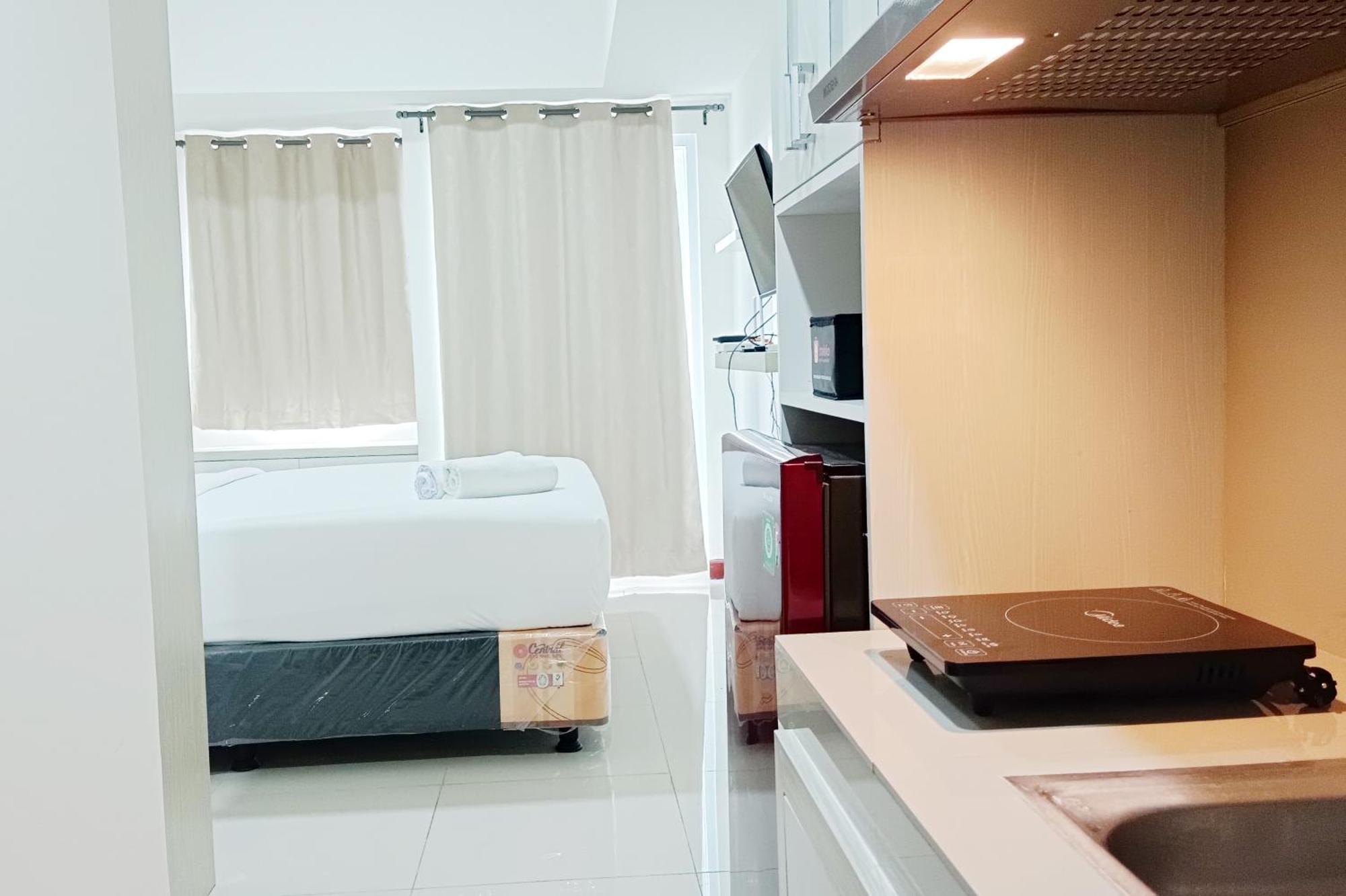 Homey And Tidy Studio Apartment At Vida View Makassar By Travelio Pampang Dış mekan fotoğraf